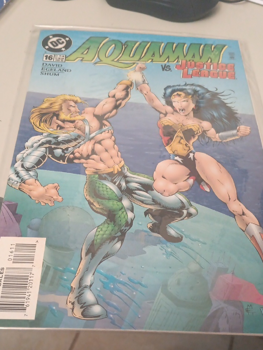 DC Aquaman vs. Justice League Comic Cover - Green, Gold, Red, Blue In Sleeve